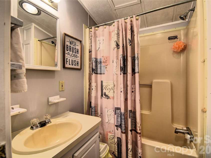 91 Mallard Loop, Waynesville, NC 28785.  MLS# CAR4372848, YatesRealty ID 23150. Bathroom 2 off the hallway