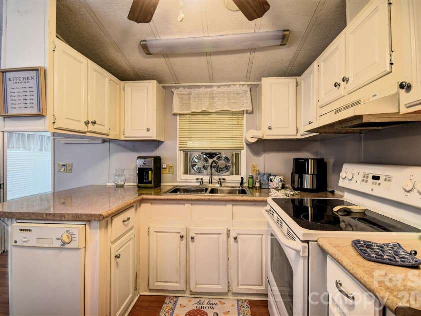 91 Mallard Loop, Waynesville, NC 28785.  MLS# CAR4372848, YatesRealty ID 23150. Kitchen with dishwasher