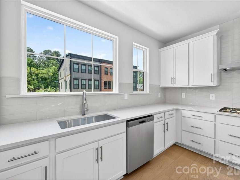 440 Old Town Village Road, Waxhaw, NC 28173.  MLS# CAR4375714, YatesRealty ID 23153. Large single bowl stainless steel sink with Touch faucet 