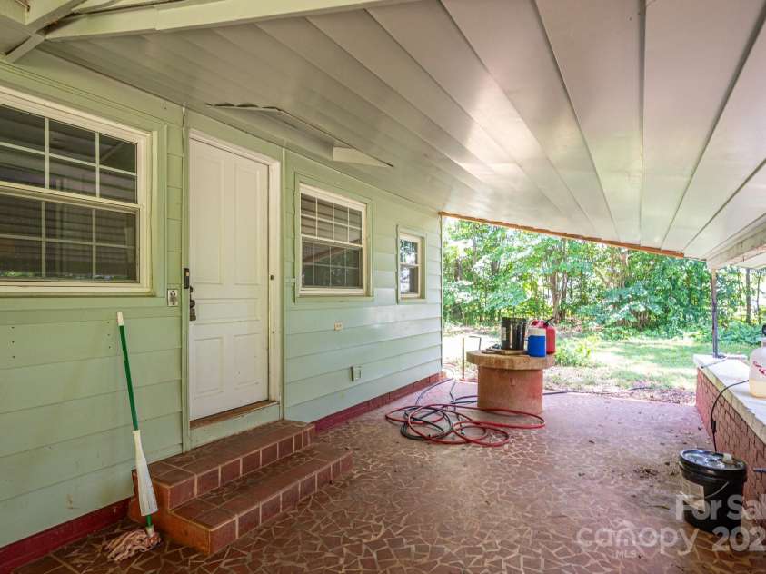 1173 Cat Square Road, Vale, NC 28168.  MLS# CAR4274063, YatesRealty ID 23159. Back patio