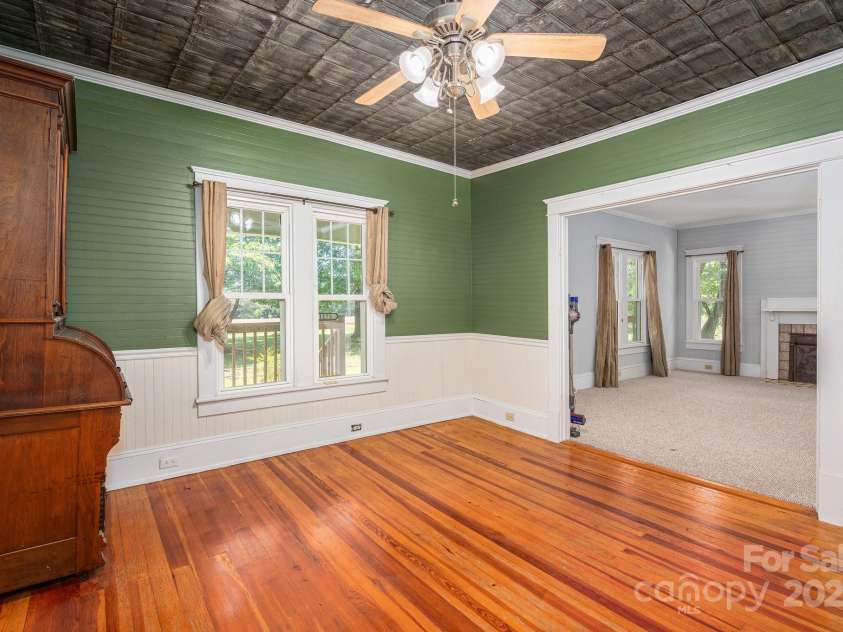 1173 Cat Square Road, Vale, NC 28168.  MLS# CAR4274063, YatesRealty ID 23159. Den looking into Living Room