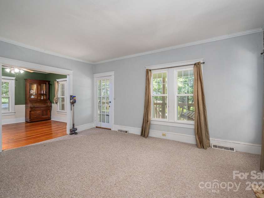 1173 Cat Square Road, Vale, NC 28168.  MLS# CAR4274063, YatesRealty ID 23159. Living room looking into Den
