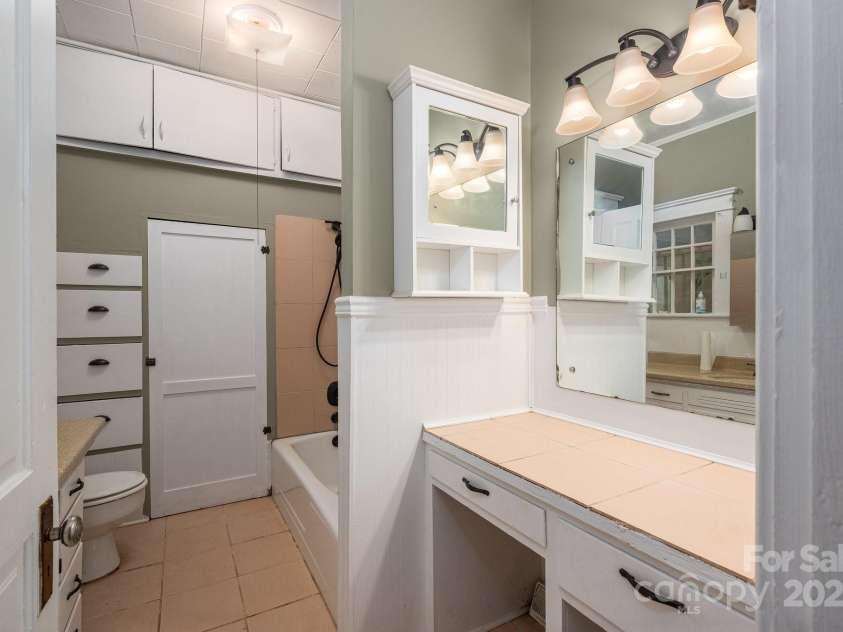 1173 Cat Square Road, Vale, NC 28168.  MLS# CAR4274063, YatesRealty ID 23159. Main floor bath with built-ins.