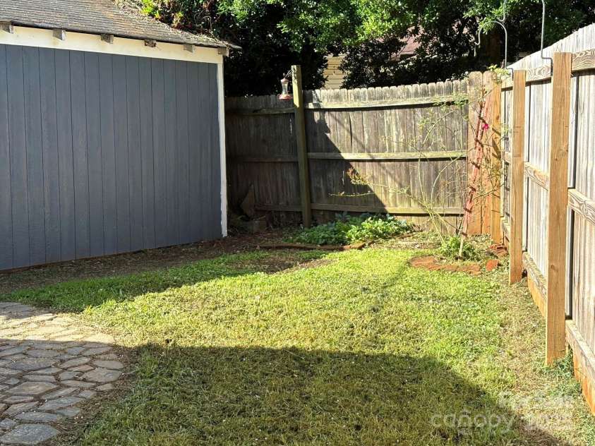 339 Mayflower Avenue, Cramerton, NC 28032.  MLS# CAR4270605, YatesRealty ID 23161. Back yard taken from rea entrance