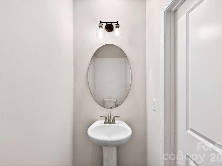 6025 Longar Lane, Charlotte, NC 28269.  MLS# CAR4376910, YatesRealty ID 23163. First floor powder