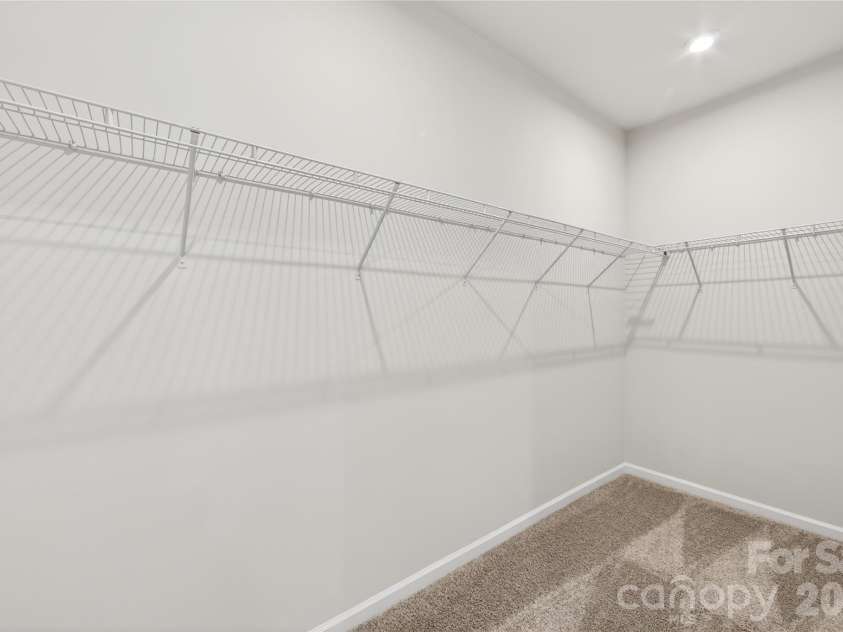6025 Longar Lane, Charlotte, NC 28269.  MLS# CAR4376910, YatesRealty ID 23163. Primary walk-in closet