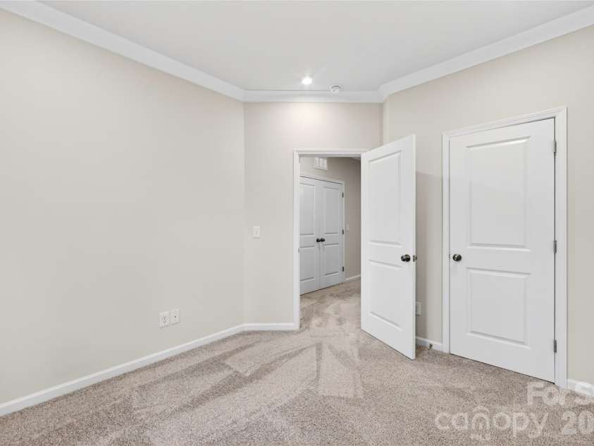 6025 Longar Lane, Charlotte, NC 28269.  MLS# CAR4376910, YatesRealty ID 23163. Secondary bedroom