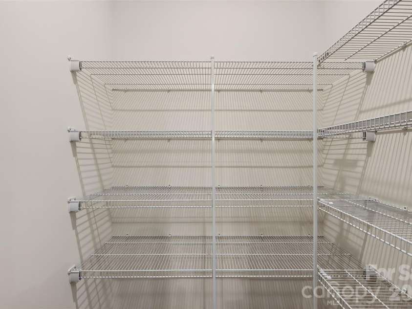 6025 Longar Lane, Charlotte, NC 28269.  MLS# CAR4376910, YatesRealty ID 23163. Walk-in pantry