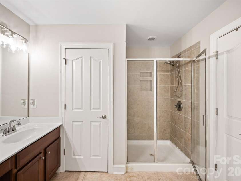 14825 Capricorn Lane, Charlotte, NC 28277.  MLS# CAR4381245, YatesRealty ID 23164. Primary Bathroom