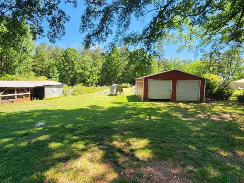 222 Carrie Drive, Oakboro, NC 28129.  MLS# CAR4378806, YatesRealty ID 23165. 
