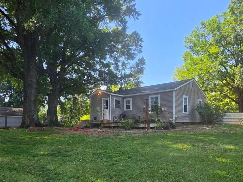 222 Carrie Drive, Oakboro, NC 28129.  MLS# CAR4378806, YatesRealty ID 23165. Rear Yard Shady and So Much Space
