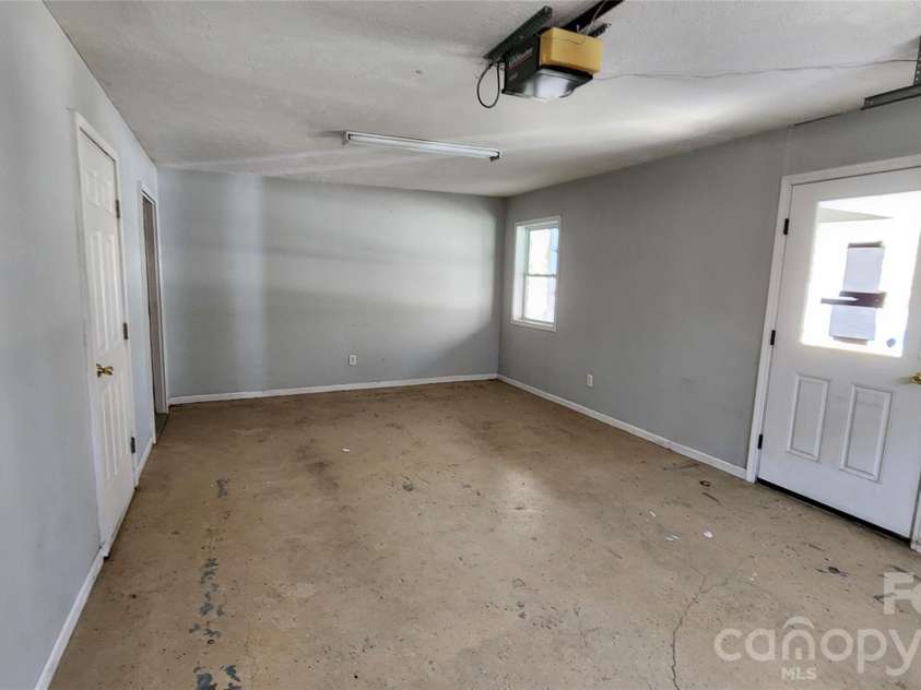 360 River Cove Lane, Hayesville, NC 28904.  MLS# CAR4383418, YatesRealty ID 23166. Garage has interior access and outside entry