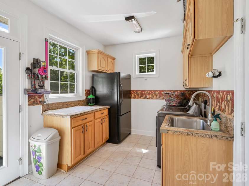 105 Spring Path, Hendersonville, NC 28739.  MLS# CAR4256171, YatesRealty ID 2317. 1st Floor Laundry/Utility room