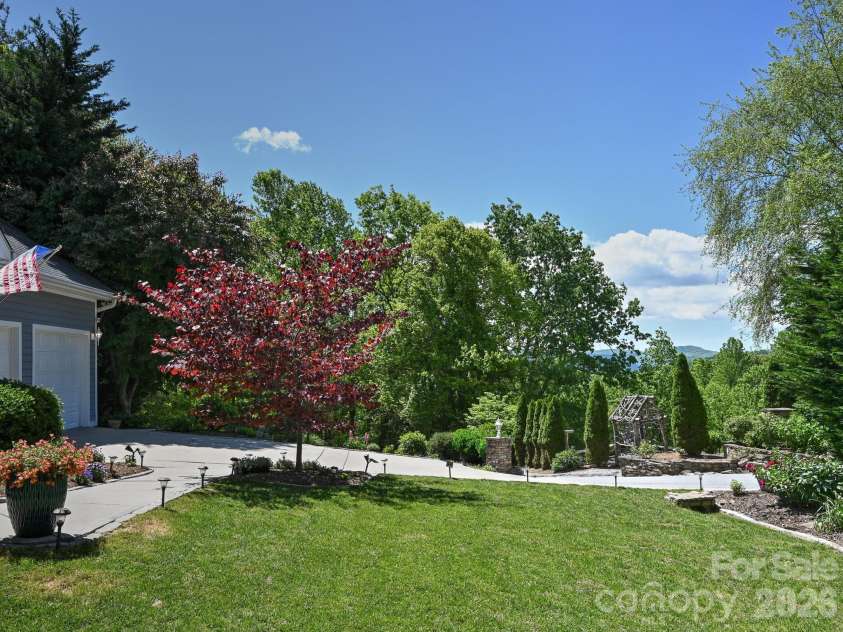 105 Spring Path, Hendersonville, NC 28739.  MLS# CAR4256171, YatesRealty ID 2317. From edge of front lot