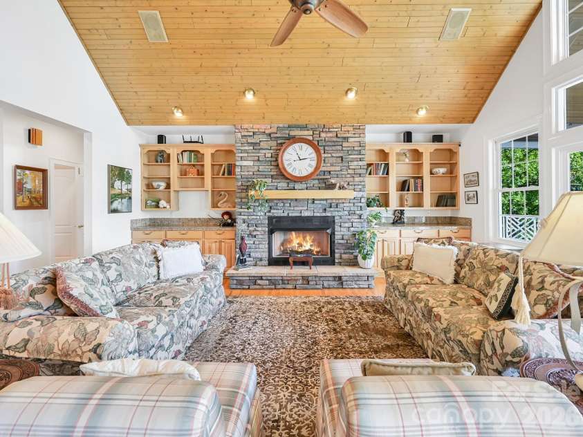 105 Spring Path, Hendersonville, NC 28739.  MLS# CAR4256171, YatesRealty ID 2317. Great Room coziness with gas logs