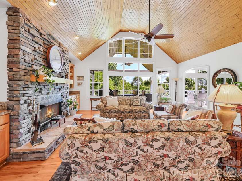 105 Spring Path, Hendersonville, NC 28739.  MLS# CAR4256171, YatesRealty ID 2317. Great Room has deck views and sliding doors