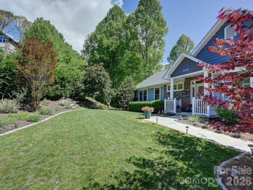 105 Spring Path, Hendersonville, NC 28739.  MLS# CAR4256171, YatesRealty ID 2317. Level front yard