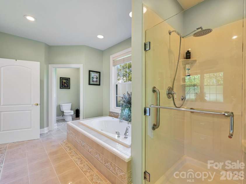 105 Spring Path, Hendersonville, NC 28739.  MLS# CAR4256171, YatesRealty ID 2317. Master Bath with walk in shower