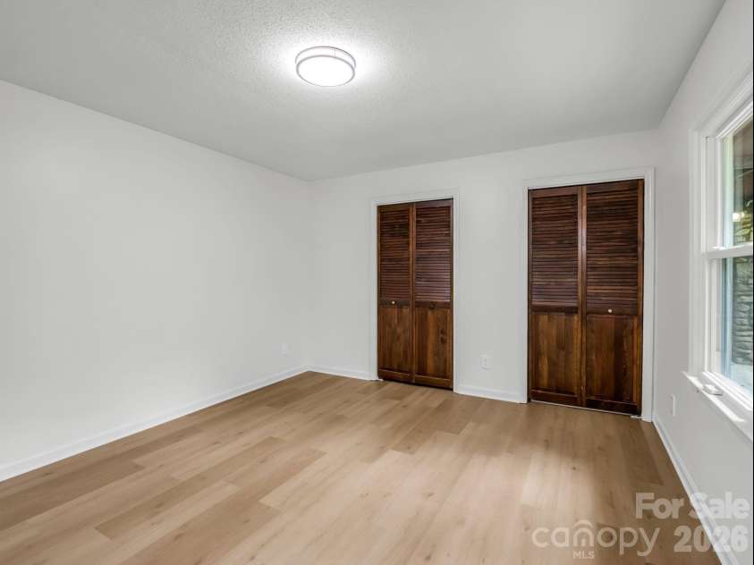 11 Deer Run Drive, Asheville, NC 28803.  MLS# CAR4377673, YatesRealty ID 23171. Double Closets in primary bdrm
