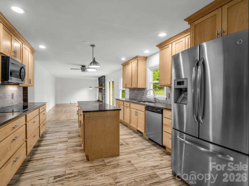 11 Deer Run Drive, Asheville, NC 28803.  MLS# CAR4377673, YatesRealty ID 23171. Open, light bright kitchen