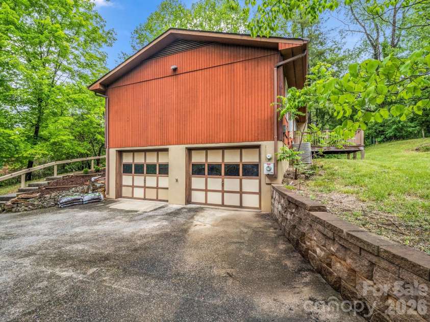 11 Deer Run Drive, Asheville, NC 28803.  MLS# CAR4377673, YatesRealty ID 23171. Pull into your new home