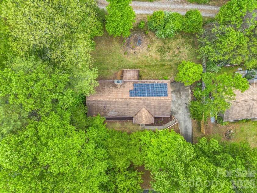 11 Deer Run Drive, Asheville, NC 28803.  MLS# CAR4377673, YatesRealty ID 23171. Solar panels for lower power bills