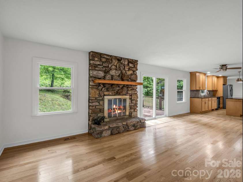 11 Deer Run Drive, Asheville, NC 28803.  MLS# CAR4377673, YatesRealty ID 23171. Woodburning Stone FP