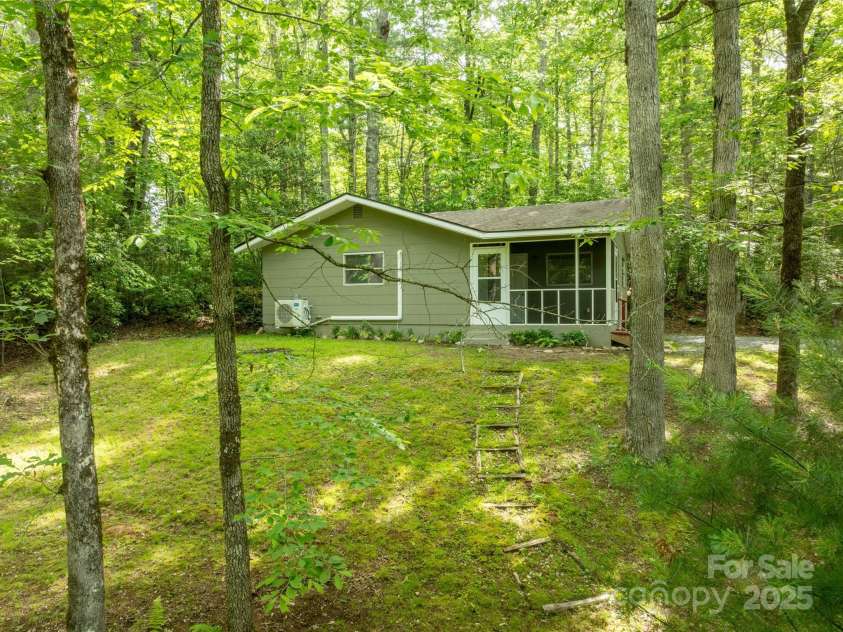 413 Rainbow Lake Drive, Brevard, NC 28712.  MLS# CAR4266354, YatesRealty ID 23172. 