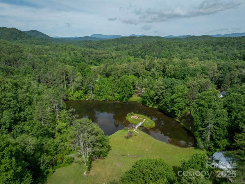 413 Rainbow Lake Drive, Brevard, NC 28712.  MLS# CAR4266354, YatesRealty ID 23172. 