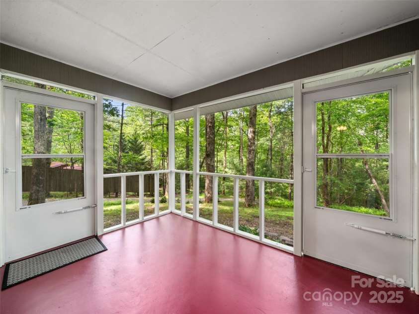413 Rainbow Lake Drive, Brevard, NC 28712.  MLS# CAR4266354, YatesRealty ID 23172. 