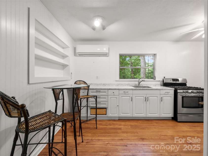 413 Rainbow Lake Drive, Brevard, NC 28712.  MLS# CAR4266354, YatesRealty ID 23172. 