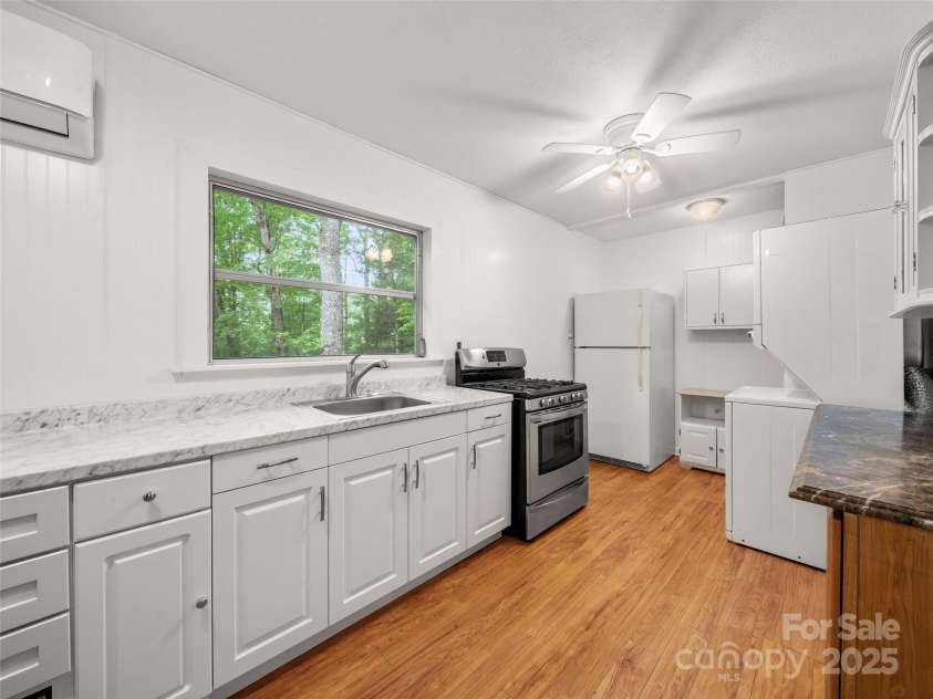 413 Rainbow Lake Drive, Brevard, NC 28712.  MLS# CAR4266354, YatesRealty ID 23172. 