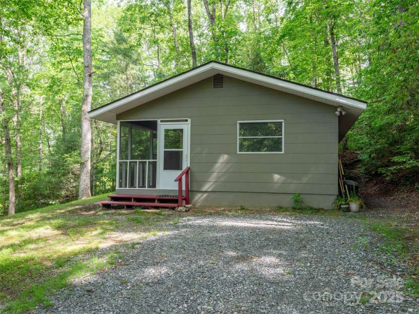 413 Rainbow Lake Drive, Brevard, NC 28712.  MLS# CAR4266354, YatesRealty ID 23172. 