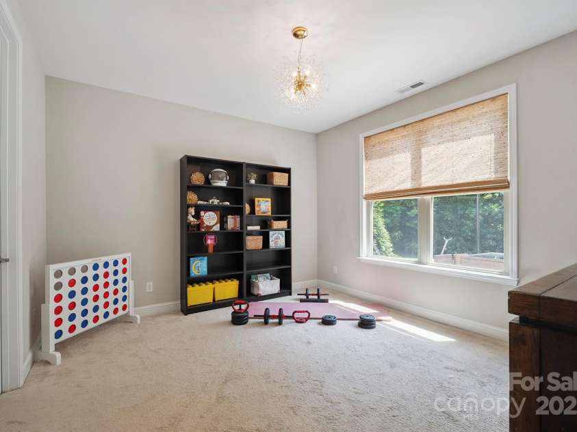 10437 Paper Birch Drive, Charlotte, NC 28215.  MLS# CAR4273974, YatesRealty ID 23173. Main floor bedroom