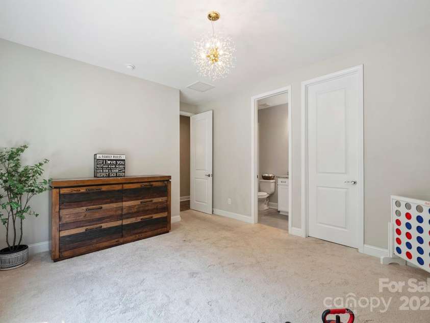10437 Paper Birch Drive, Charlotte, NC 28215.  MLS# CAR4273974, YatesRealty ID 23173. Main floor bedroom