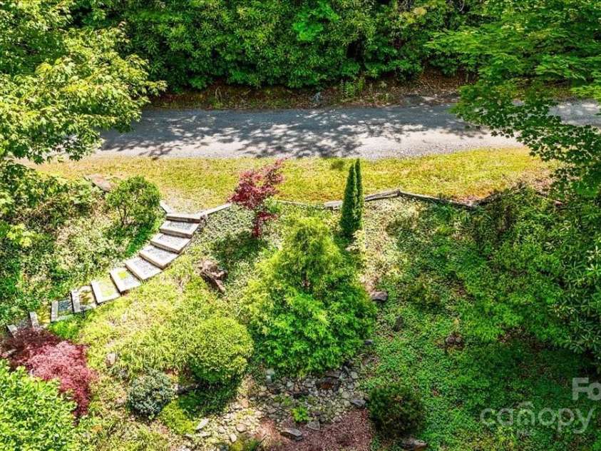 455 Lookout Drive, Pisgah Forest, NC 28768.  MLS# CAR4269478, YatesRealty ID 23174. 