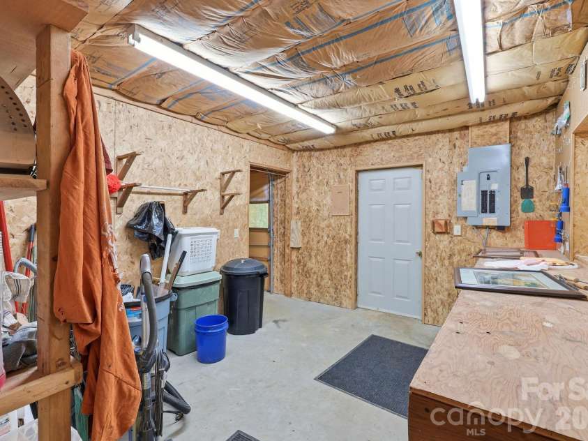 169 Sleepy Hollow Lane, Canton, NC 28716.  MLS# CAR4372033, YatesRealty ID 23176. Basement workshop
