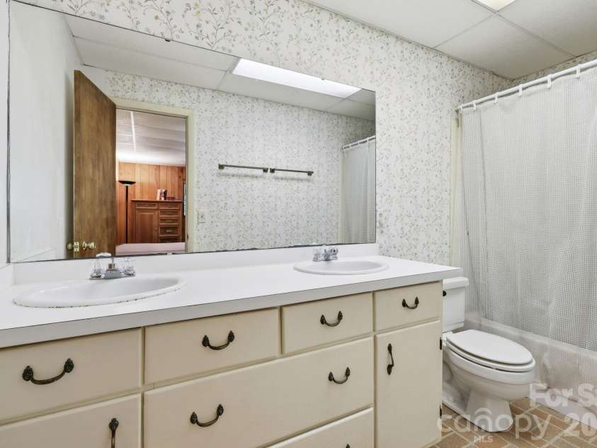169 Sleepy Hollow Lane, Canton, NC 28716.  MLS# CAR4372033, YatesRealty ID 23176. Lower master bath