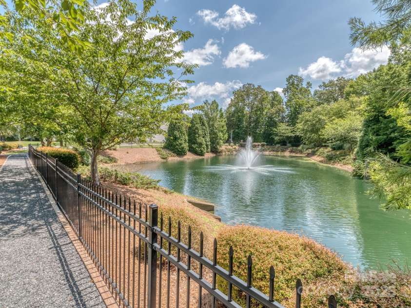 739 Elders Story Road, Fort Mill, SC 29708.  MLS# CAR4271442, YatesRealty ID 23178. Community pond / walking trail