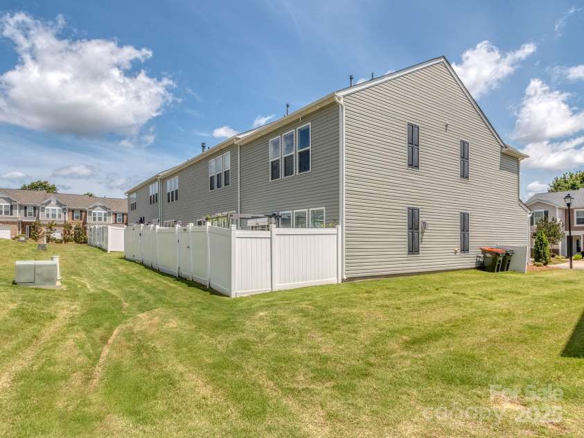 739 Elders Story Road, Fort Mill, SC 29708.  MLS# CAR4271442, YatesRealty ID 23178. Side yard