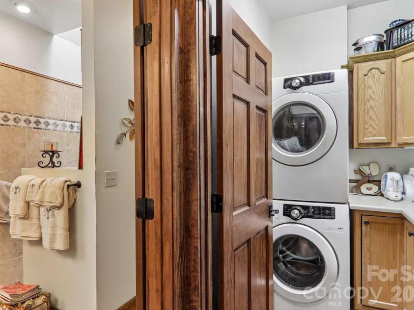 519 Susanna Cove Road, Mars Hill, NC 28754.  MLS# CAR4368251, YatesRealty ID 23179. Laundry Room/Pantry Off Kitchen
