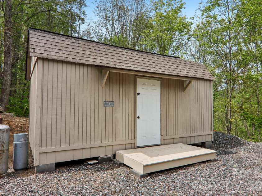 519 Susanna Cove Road, Mars Hill, NC 28754.  MLS# CAR4368251, YatesRealty ID 23179. Storage Building