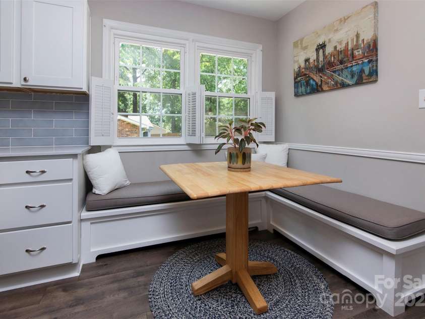 1427 Worcaster Place, Charlotte, NC 28211.  MLS# CAR4252572, YatesRealty ID 23180. Breakfast nook with storage in benches...