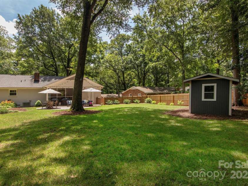 1427 Worcaster Place, Charlotte, NC 28211.  MLS# CAR4252572, YatesRealty ID 23180. Large backyard with shed...