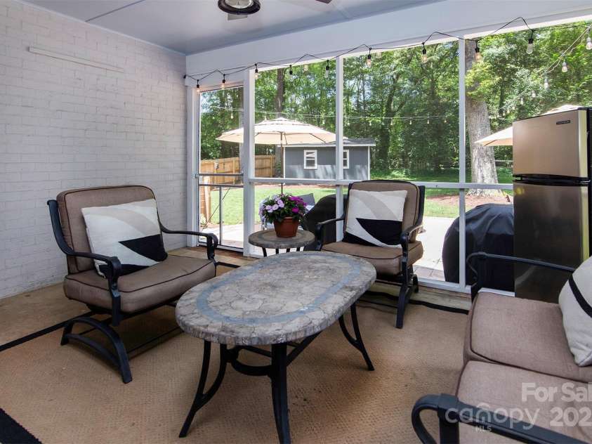 1427 Worcaster Place, Charlotte, NC 28211.  MLS# CAR4252572, YatesRealty ID 23180. Screened in porch off of family room...