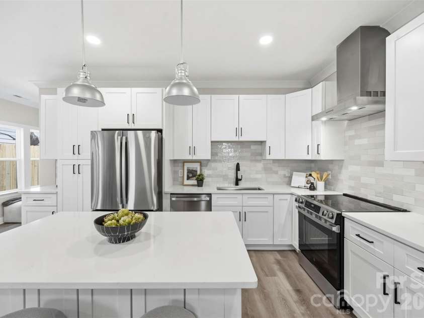 105 Smallwood Place, Charlotte, NC 28216.  MLS# CAR4341143, YatesRealty ID 23188. 