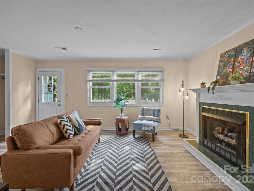 790 Thompson Road, Saluda, NC 28773.  MLS# CAR4272075, YatesRealty ID 23192. Living area view from kitchen