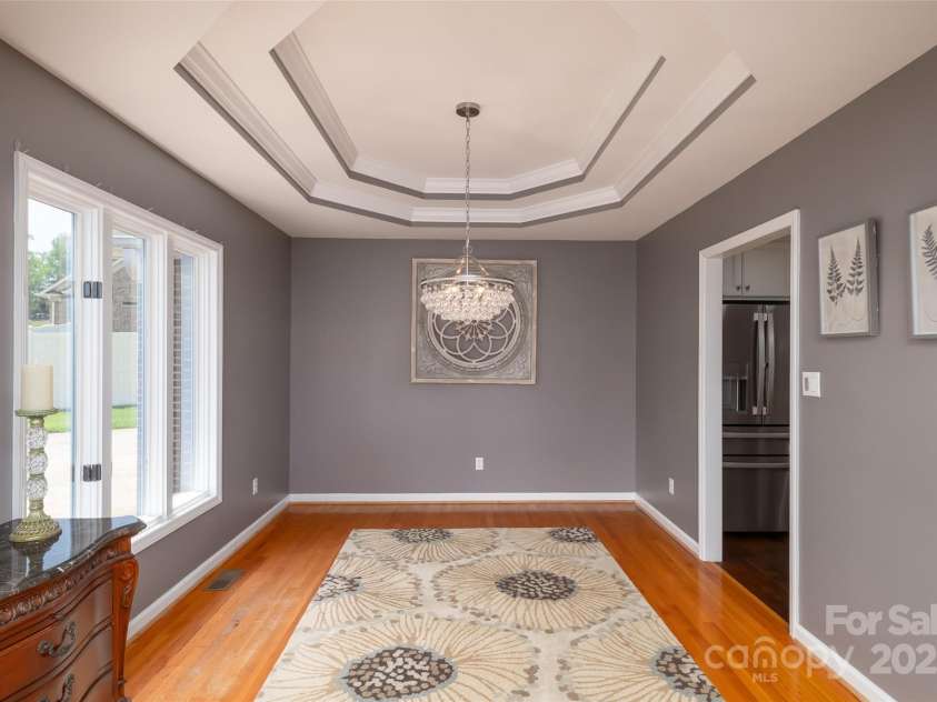 139 Hardwick Drive, Mooresville, NC 28115.  MLS# CAR4270684, YatesRealty ID 23196. Dining room with tray ceiling!