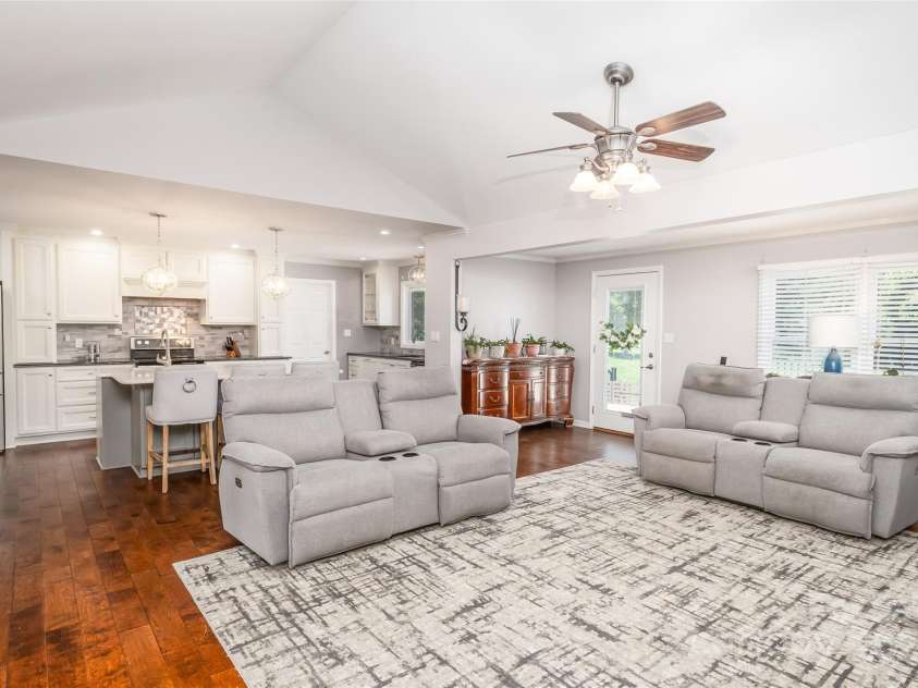 139 Hardwick Drive, Mooresville, NC 28115.  MLS# CAR4270684, YatesRealty ID 23196. Family room offers vaulted ceiling and lots of natural light