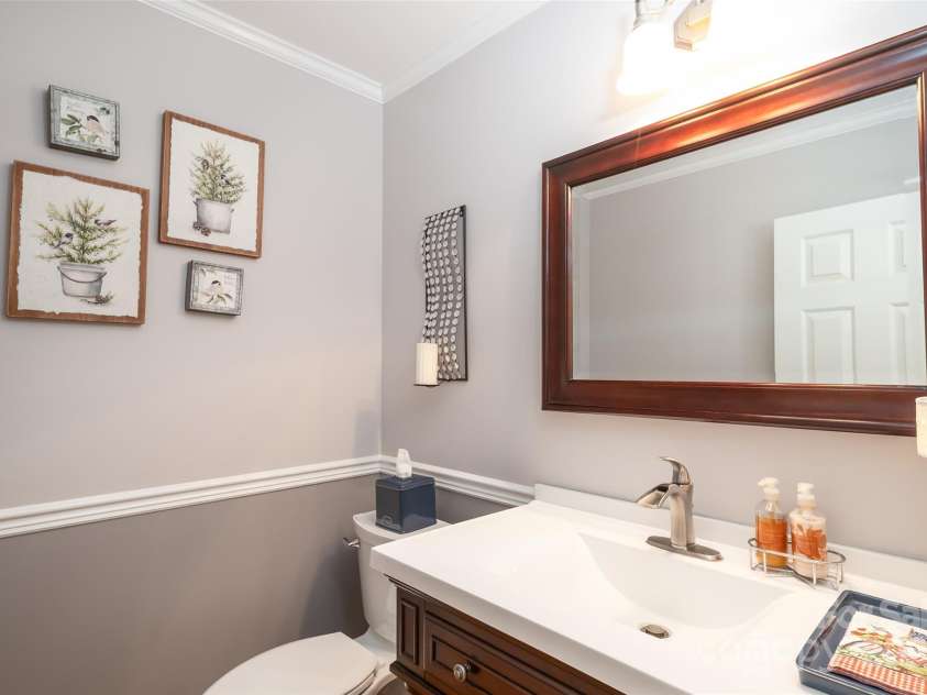 139 Hardwick Drive, Mooresville, NC 28115.  MLS# CAR4270684, YatesRealty ID 23196. Half bath located off the foyer for guests!